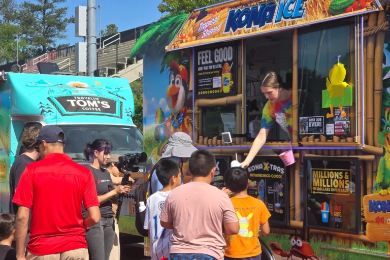Quick service, cool treats, and secure payments—powered by Dejavoo’s P12 on the road with Kona Ice.